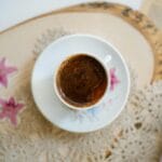 artistic overhead view of coffee in elegant cup
